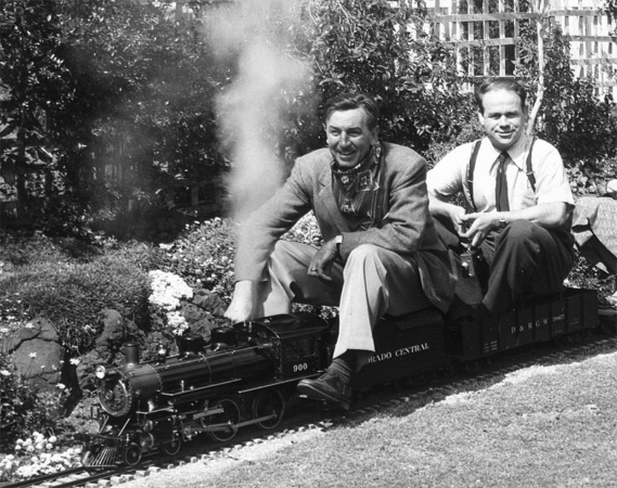 Ward Kimball and Walt Disney visit the home of Dick Jackson, a wealthy businessman who operated a scale-railroad in his backyard